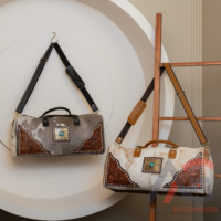 Nouvel arrivage de sacs polochons en cuir fourrure usinés à la main vintage élégants sacs de voyage unisexe en cuir fourrure de vachette pierre turquoise