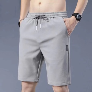 Short de bain à séchage rapide pour hommes, maillot de plage décontracté en nylon et polyester avec motif solide, méthode de tissage non tissé - Product Image 4