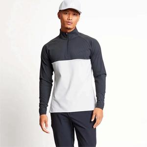 Camiseta de golf Performance 1/4 con cremallera para Hombre | Ligero y absorbente de humedad, perfecto para un juego cómodo - Product Image 1