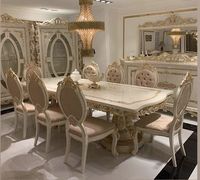Ensemble table et chaises de salle à manger de luxe en bois exquis, parfait pour les grandes réunions de famille et les dîners élégants à la maison