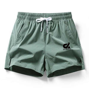 Logo personnalisé Shorts de course pour hommes Pantalons élastiques d'entraînement Gym Couleur unie Shorts décontractés pour femmes Fabricants de vêtements - Product Image 3