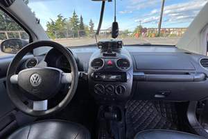 VOLKSWAGEN NEW BEETLE 2008 D'OCCASION CÔTÉ GAUCHE/DROIT - Product Image 4