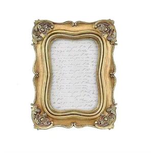 Décoration de miroir mural en métal de style américain Cadre photo au design moderne de premier ordre Matériau doré Personnalisé en vrac Fabriqué à la main - Product Image 1