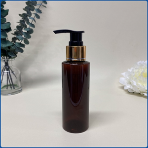 Botella de plástico PET transparente de 100ml con forma cilíndrica para el cuidado de la piel Características cosméticas Impresión de logotipo personalizado Fabricado directamente - Product Image 1