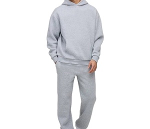 Conjunto de chándal de gran tamaño personalizable para hombre Sudadera con capucha de algodón 100% y pantalones de Jogger a la venta en chándal de color sólido para hombre - Product Image 1
