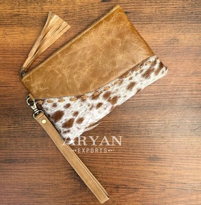 Venta al por mayor de moda de lujo de diseñador de cuero de vaca bolso de mano para las mujeres de alta calidad de cuero genuino cartera borla cremallera bolsa - Product Image 1