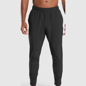 Pantalones de hombre con cordón al por mayor, pantalones holgados personalizados para hombre, pantalones de gimnasio para hombre superventas - Product Image 1