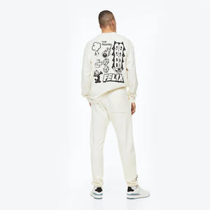 กางเกงวอร์มสำหรับวิ่งจ๊อกกิ้งรุ่นพื้นฐานสีเบจสำหรับผู้ชายมีสไตล์พิมพ์ลายหน้าจอออกแบบได้ตามต้องการและเอวยางยืด - Product Image 4