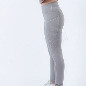 Leggings de yoga de couleur unie avec logo personnalisé de haute qualité pour femmes, pantalon sans couture d'entraînement de gymnastique de nouveau style avec fermeture à la taille élastique - Product Image 5