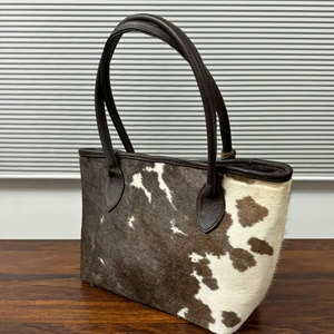 2025 nuevo estilo precio razonable bolsos de moda de cuero de vaca para mujer al por mayor bolso de cuero de vaca genuino para niñas - Product Image 5