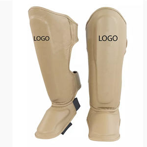 Protège-tibia en cuir personnalisé de sublimation OEM pour unisexe Design unique Protège-tibia de boxe noir Logo personnalisé - Product Image 1