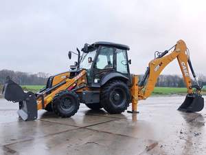 Chargeur rétrocaveuse Super N haute performance en bon état 580 en stock disponible pour achat immédiat meilleur prix - Product Image 6