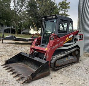 รถตักล้อยางขนาดเล็กมือสอง Takeuchi TL8 สำหรับขาย - Product Image 1