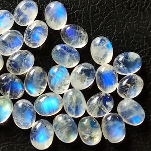 Cabochon de pierre de lune arc-en-ciel de haute qualité 3x5mm ovale pierre de lune lisse pierres de feu bleues pour bijoux prix de gros Lot - Product Image 1
