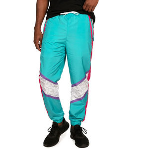 Pantalones cortavientos personalizados impermeables ligeros con opciones de logotipo para entrenamiento actividades al aire libre correr gimnasio y uso diario - Product Image 1