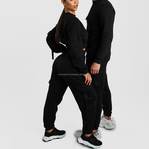 Vente en gros Nom de marque personnalisé Ensemble de jogging d'hiver en coton pour femmes Survêtement à capuche Haut court Solide Polaire Survêtements délavés - Product Image 3