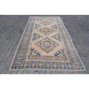 Alfombra Turca Vintage Grande de 5.1x10.1 pies, Alfombra de Lana con Borde Azul - Product Image 1