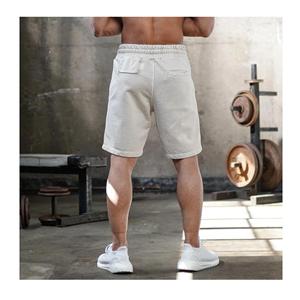 Pantalones cortos de gimnasio de algodón ecológico sólido de nuevo estilo para hombre, pantalones cortos deportivos Cargo de malla de nailon con estampado de logotipo personalizado para correr, secado rápido - Product Image 2