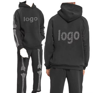 Chándal personalizado con diamantes de imitación para hombres y mujeres con logotipo personalizado en la parte delantera y trasera, trabajo con diamantes de imitación en los brazos y pantalones - Product Image 1