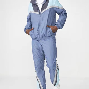 Chándal cortavientos de nailon con capucha y cremallera para hombre, conjunto de Jogger de invierno con logotipo personalizado de fabricante, ropa deportiva en blanco - Product Image 1