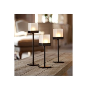 Hot selling <b>candle</b> <b>holder</b> latest design dining table decorative <b>candle</b> <b>holder</b> premium quality black iron candlestick - Product Image 1