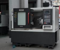Torno CNC de Bancada Inclinada Compacto con Refrigeración de Alta Presión, Estructura Rígida Lista para Usar para Piezas Metálicas Compactas y Barras de 52 mm