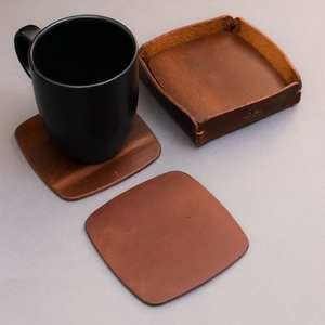Elegant rustic leather coasters with high quality handmade look and premium <b>protection</b> for <b>table</b> surfaces - Product Image 1
