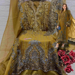 Élégance intemporelle: Organza Shalwar Kameez de qualité supérieure avec un travail manuel complexe et un tissu Santoon lourd et terne. - Product Image 1