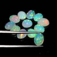 Vente en gros de cabochons ovales en opale éthiopienne blanche naturelle Welo Fire Opal Pierres précieuses en vrac pour la fabrication de bijoux pendentifs Approvisionnement en vrac