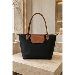 Bolso de Mano con Solapa de Piel de Vaca Bicolor Negro-Marrón, Acabado Granulado Elegante para Uso en Mano y Hombro - Product Image 1