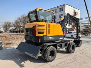 Mini-excavatrice sur pneus HW60 jaune, capacité de la benne de 0,21 m³, moteur et boîte de vitesses à haute puissance de creusement - Product Image 3