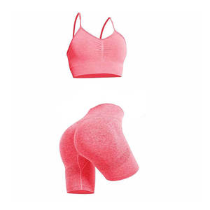 Conjunto de sujetador y pantalones cortos de yoga para mujer de algodón a la moda con logotipo personalizado sin costuras para entrenamiento de gimnasio conjunto de 2 piezas de cintura alta - Product Image 1