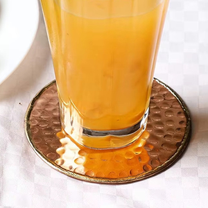 Ensemble de sous-verre en cuivre de luxe de 4 pouces pour la vaisselle en verre de café de thé conçue pour la décoration de table et l'accessoire - Product Image 1