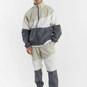 STITCHMODE Fabricant Vente en gros Ensemble coupe-vent de course léger Motif solide Jogging Survêtement avec grande taille - Product Image 1