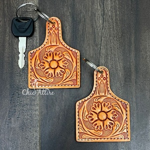 พวงกุญแจหนังวัวแท้ทำมือ งานฝีมือคุณภาพสูง ราคาโรงงาน รับทำตามแบบ สไตล์แฟชั่น สำหรับกระเป๋า รถยนต์ และของขวัญ - Product Image 1