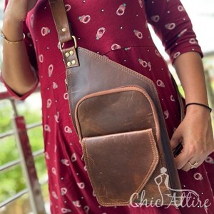 กระเป๋าเดินทางสะพายไหล่หนังแท้ใช้ได้ทั้งชายและหญิงมีสไตล์ใหม่ขายดีกระเป๋าเงินอเนกประสงค์กระเป๋าคาดอกที่มีประโยชน์คุณภาพสูง - Product Image 1