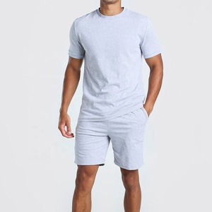 ชุดกีฬาสองชิ้นระบายอากาศได้ดีในฤดูร้อนของผู้ชายเสื้อโปโลลายสีพื้นและกางเกงวิ่งรัดรูปชุดวอร์ม - Product Image 2