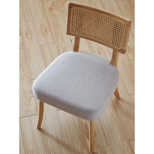Nordic <strong>Design</strong> Dining Chair with Wooden Frame and Woven Natural Rattan and Upholstery for Modern Contemporary Homes - Product Image 1