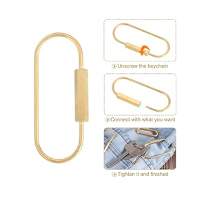 Anneau porte-clés ovale en métal doré robuste avec clip à ressort pour clés et accessoires de sac - Product Image 2