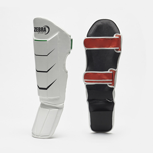 Protège-tibias de sport Muay Thai en cuir véritable Zebra, durables, professionnels, protection d'entraînement, logo personnalisé, boxe MMA, vente en gros - Product Image 1