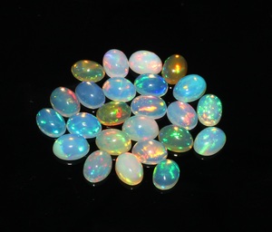 24-Piece 13.60 Carats Ethiopian Opal Cabochons Natural Ovals 5x7mm Loose Gemstones Oval Cut - Product Image 2
