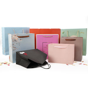 Sacs en papier imprimés personnalisés promotionnels de haute qualité avec logo idéaux pour les événements de festival et le marketing de marque - Product Image 3