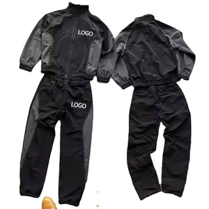 Venta al por mayor en blanco personalizado cremallera chándales hombres nailon rompevientos conjunto hombres chándal conjunto - Product Image 1