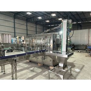 Máquina de llenado automática eléctrica de alta velocidad de 220V 120 BPM Capacidad de 2000BPH para bebidas Jugos Líquidos en botellas de latas de 500ml - Product Image 2