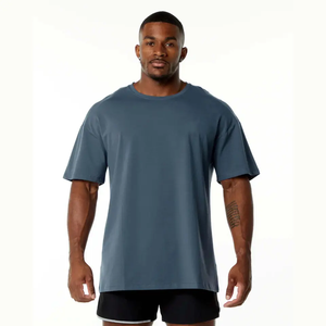 เสื้อยืดผ้าคอตตอนเนื้อนุ่มสำหรับผู้ชายทรงโอเวอร์ไซส์ดีไซน์ตัดกันทรงปล่อยไหล่ใส่สบาย - Product Image 1