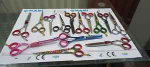 Direct du fabricant Logo personnalisé Ciseaux à effiler les cheveux de 5.5 pouces avec repose-doigt Lame en acier inoxydable Produit de beauté - Product Image 6