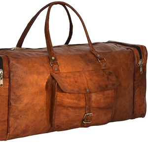 Bolsa de lona vintage de cuero marrón con cierre de cremallera y bolsillo frontal para viajes estilo fin de semana - Product Image 1