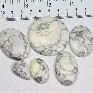 หินโฮไลต์ธรรมชาติคุณภาพเยี่ยม ขัดเงาเรียบ รูปทรงคละแบบ จำหน่ายจำนวนมาก ราคาส่ง เกรด A.A.A สำหรับทำเครื่องประดับ - Product Image 1