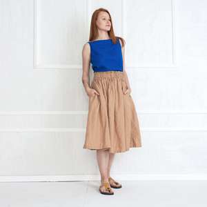 Mini jupe en lin pour dames Nouveau design Taille haute asymétrique Kaki tissé avec taille naturelle OEM personnalisable Drop Shipping - Product Image 1