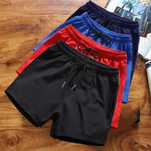 Short de course Hip Hop 100% coton pour homme Short de sport à taille élastique et cordon de serrage avec jambe large Short d'extérieur de couleur unie - Product Image 1